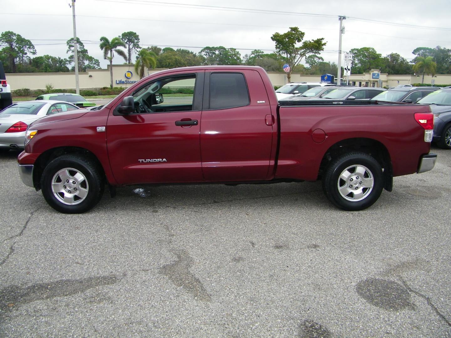 2010 Maroon /Gray Toyota Tundra SR5 Double Cab 4.6L 2WD (5TFRM5F14AX) with an 4.6L V8 DOHC 32V engine, 5-Speed Automatic Overdrive transmission, located at 4000 Bee Ridge Road, Sarasota, FL, 34233, (941) 926-0300, 27.298664, -82.489151 - Photo#2